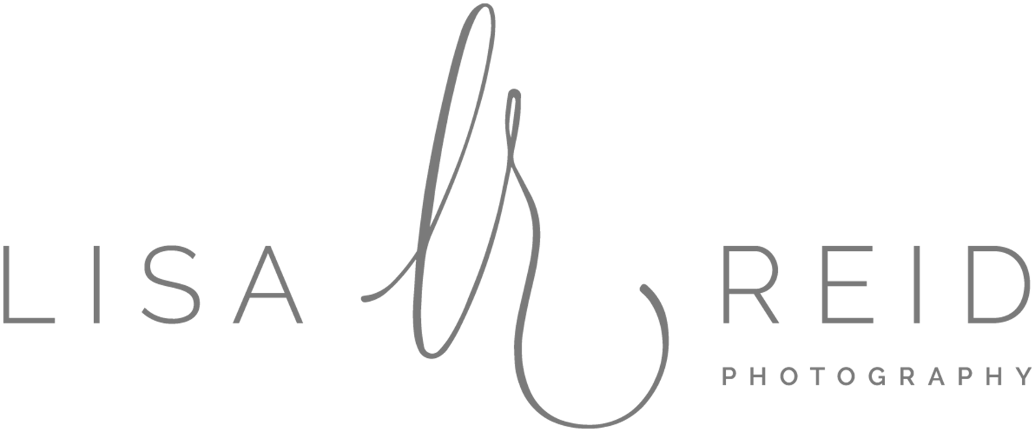 A logo of a company called "Lisa Reid Photography"